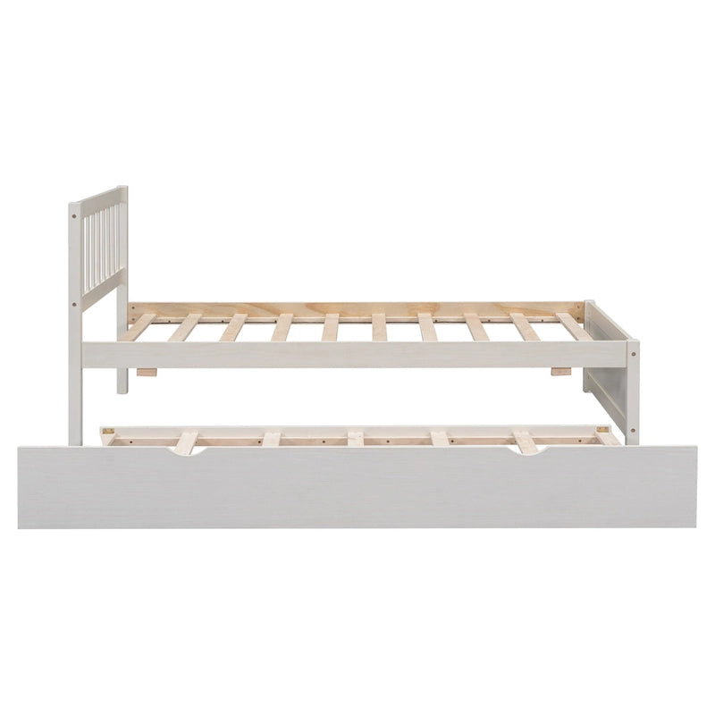 Lit plateforme jumeau avec lit gigogne escamotable et tête de lit avec barrière